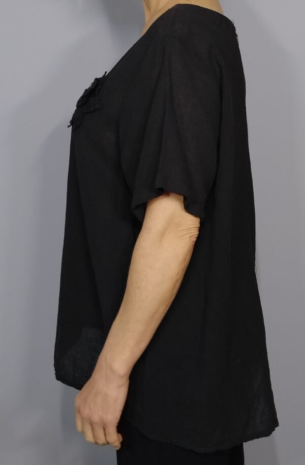 Blusa Botones Espalda: Elegancia Natural con un Toque Especial