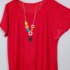 Blusa Brisa Italiana: frescura perforada con collar incluido