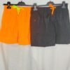 banyador_S-4038-NEGRO_NARANJA-001 Bañador con Bolsillos – Corte Suelto & Cremallera Segura
