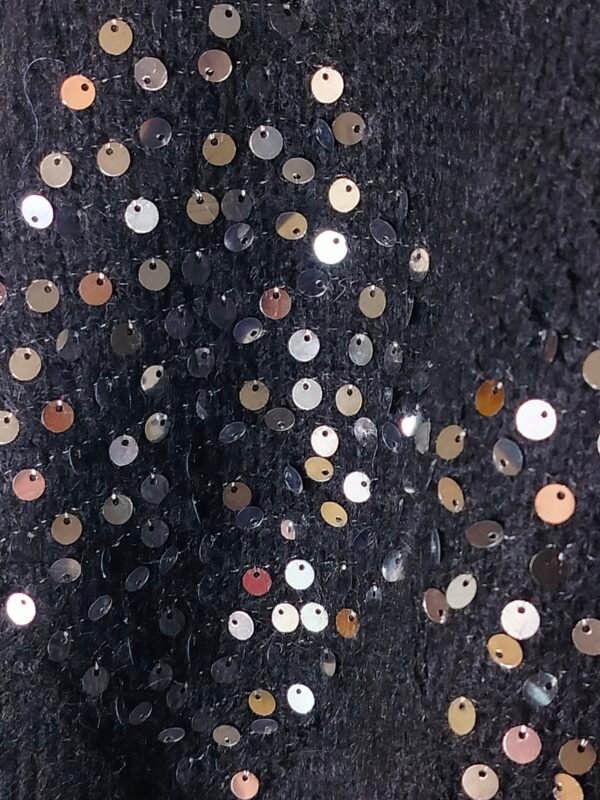 oplus_32 Suéter de Punto Rombos – Elegancia en Cada Día