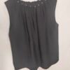 oplus_34 Blusa Sin Mangas Remache – Frescura Elegante para Días de Verano