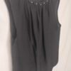 oplus_34 Blusa Sin Mangas Remache – Frescura Elegante para Días de Verano