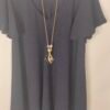 oplus_34 Blusa Acampanada con Collar – Elegancia Fresca que Resiste el Ritmo del Verano