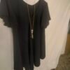 oplus_34 Blusa Acampanada con Collar – Elegancia Fresca que Resiste el Ritmo del Verano