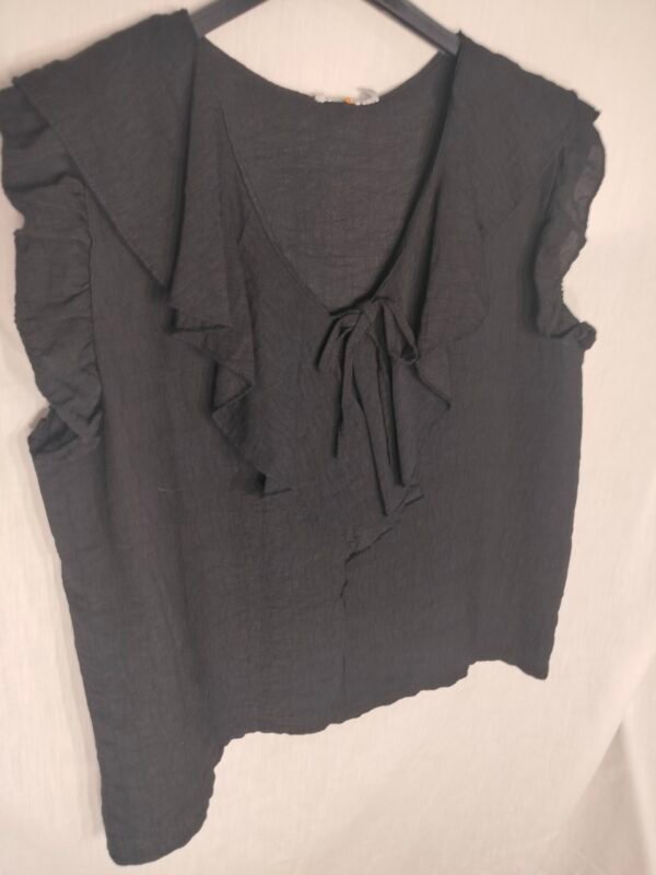 Blusa de Volantes – Elegancia Fresca para Días que No Paran