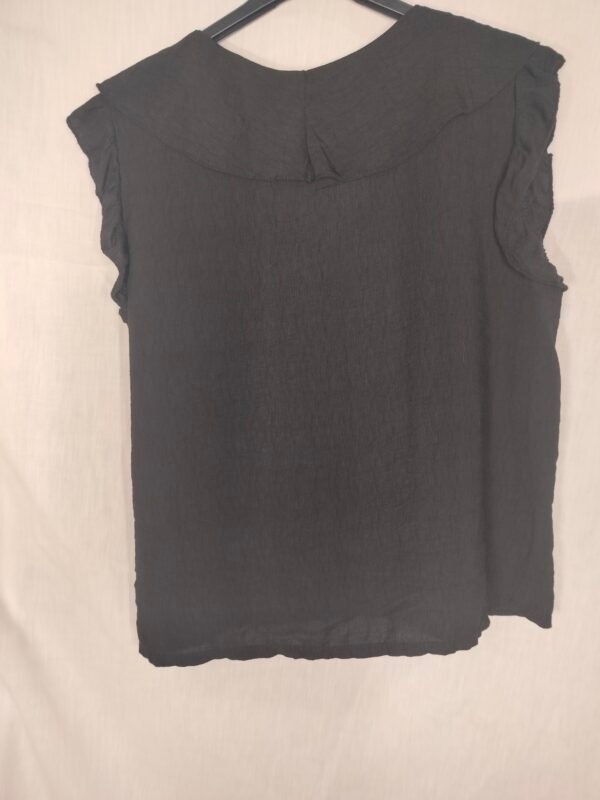 Blusa de Volantes – Elegancia Fresca para Días que No Paran